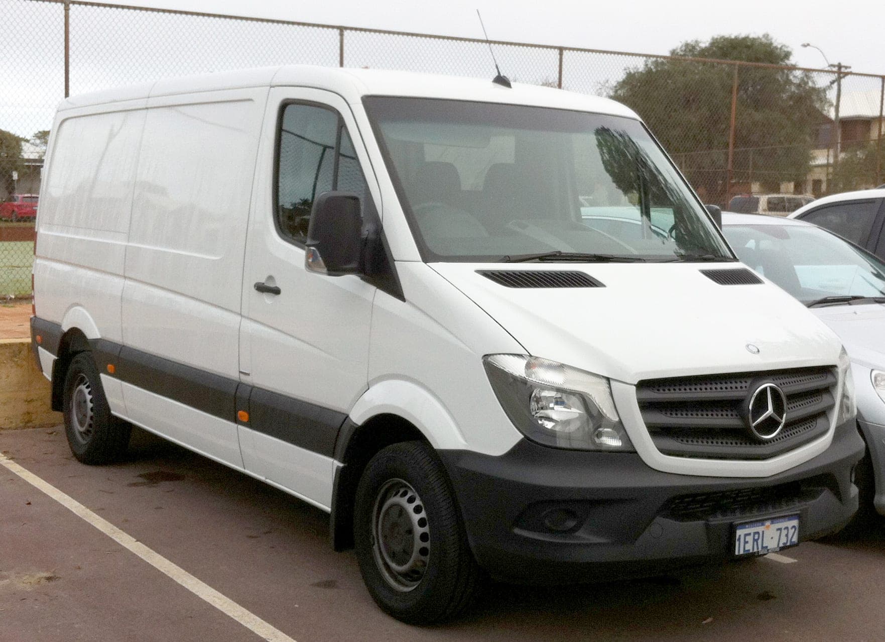 Delivery van fleet, 5 vans on daily rounds across Riga, rear doors and side panels — Dārzciems, Riga